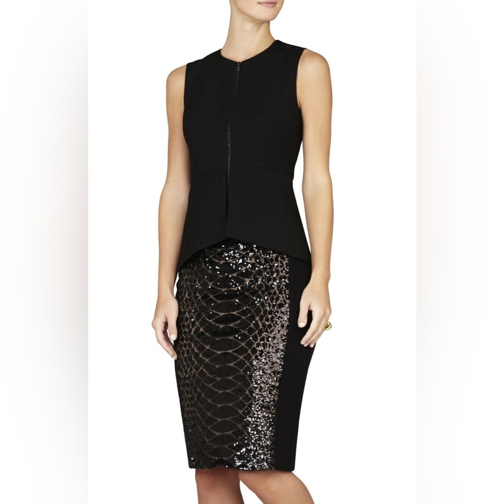 BCBG MAXAZRIA BLACK
ABRIELLE SLEEVELESS PEPLUM GOTH TOP IZD1R776/SIZE XXS